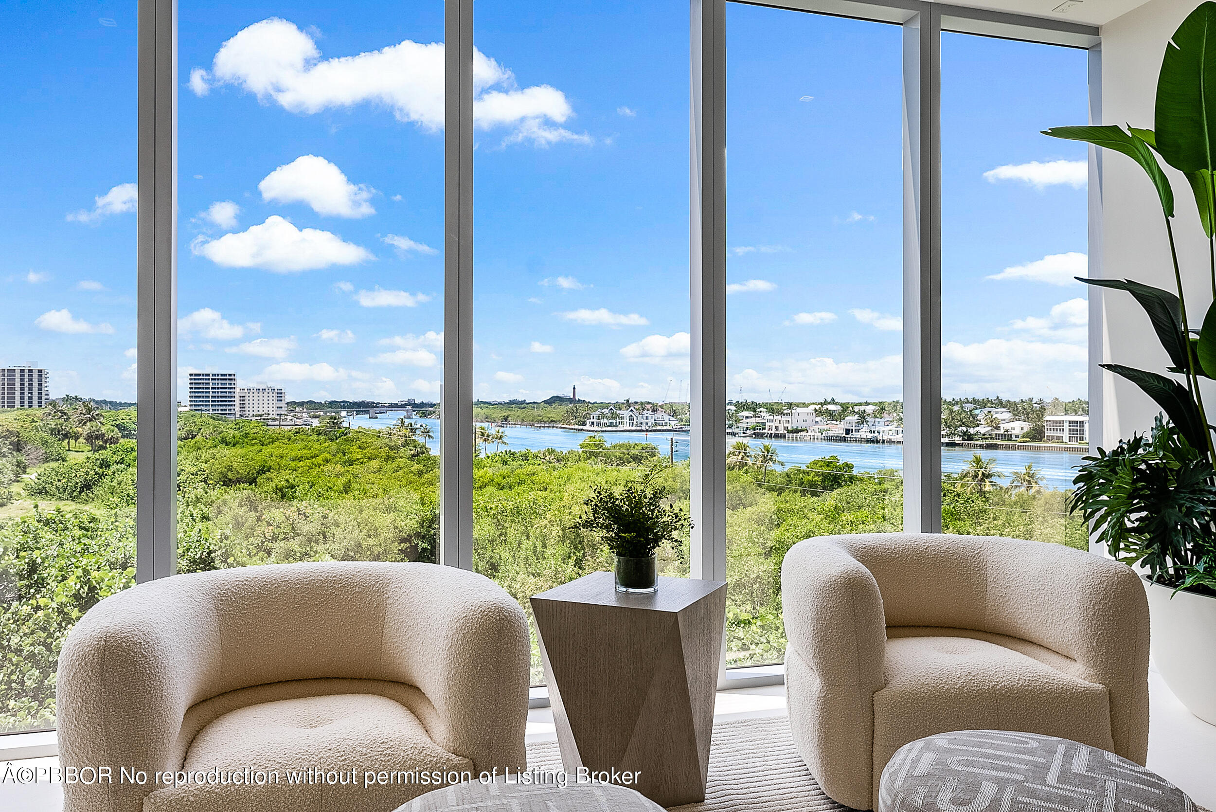 1500 South Beach Road, Unit 403 Jupiter, FL 33469 - Photo 13 of 36 a living room with furniture and a large window