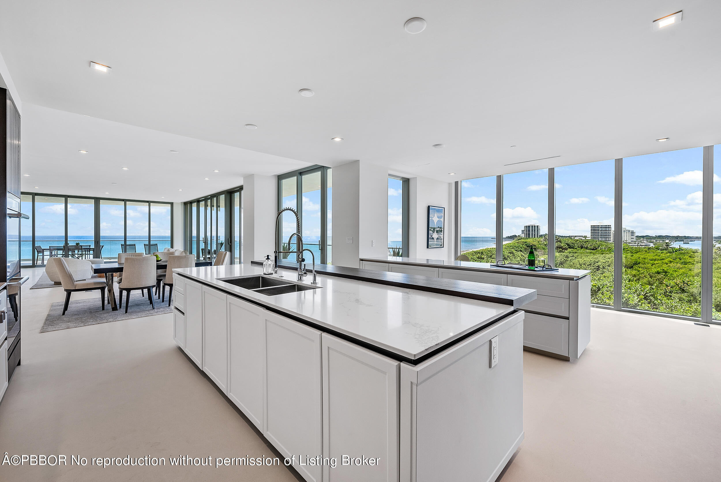 1500 South Beach Road, Unit 403 Jupiter, FL 33469 - Photo 16 of 36 a kitchen with large counter top space and living room