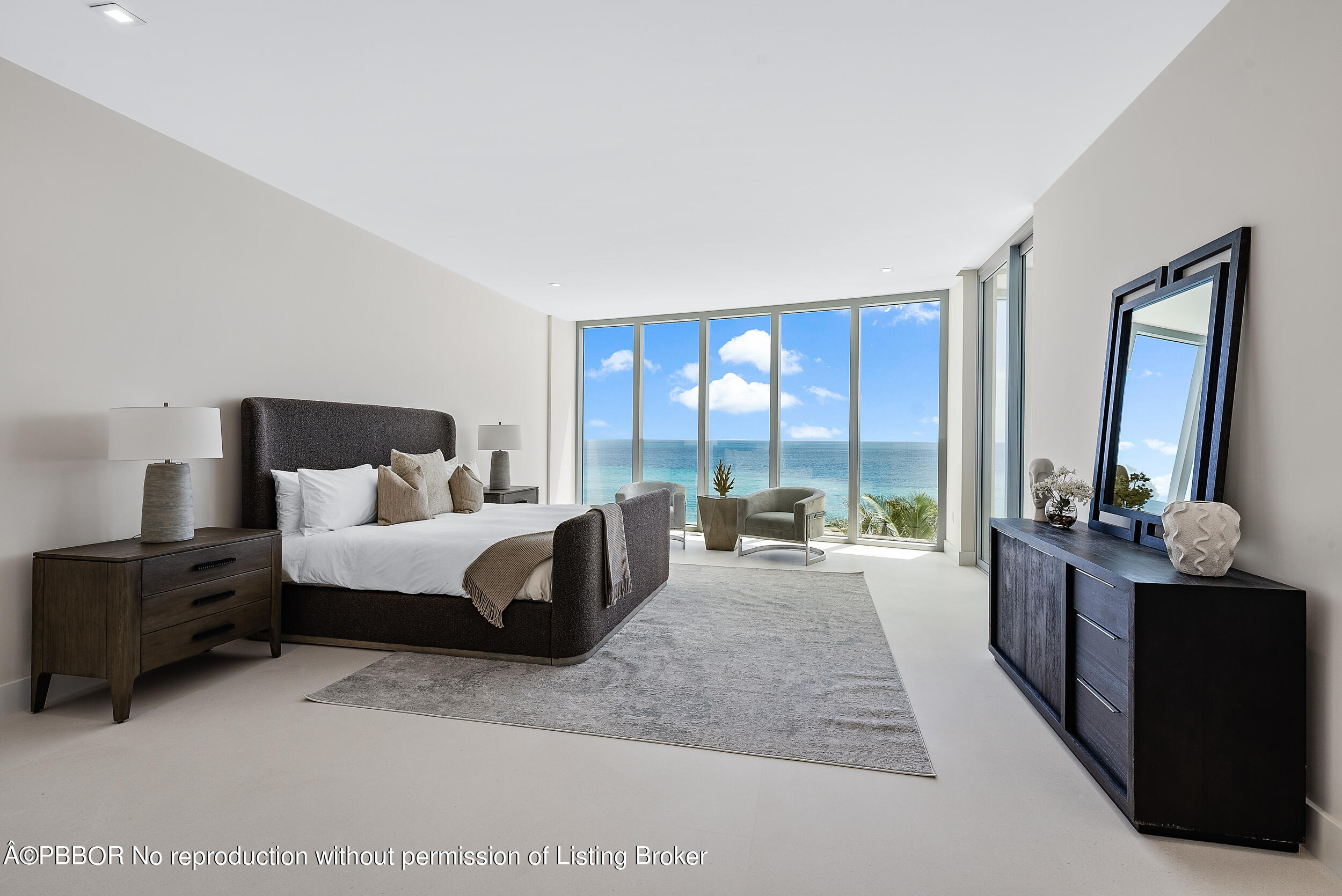 1500 South Beach Road, Unit 403 Jupiter, FL 33469 - Photo 20 of 36 a spacious bedroom with a bed and a large window