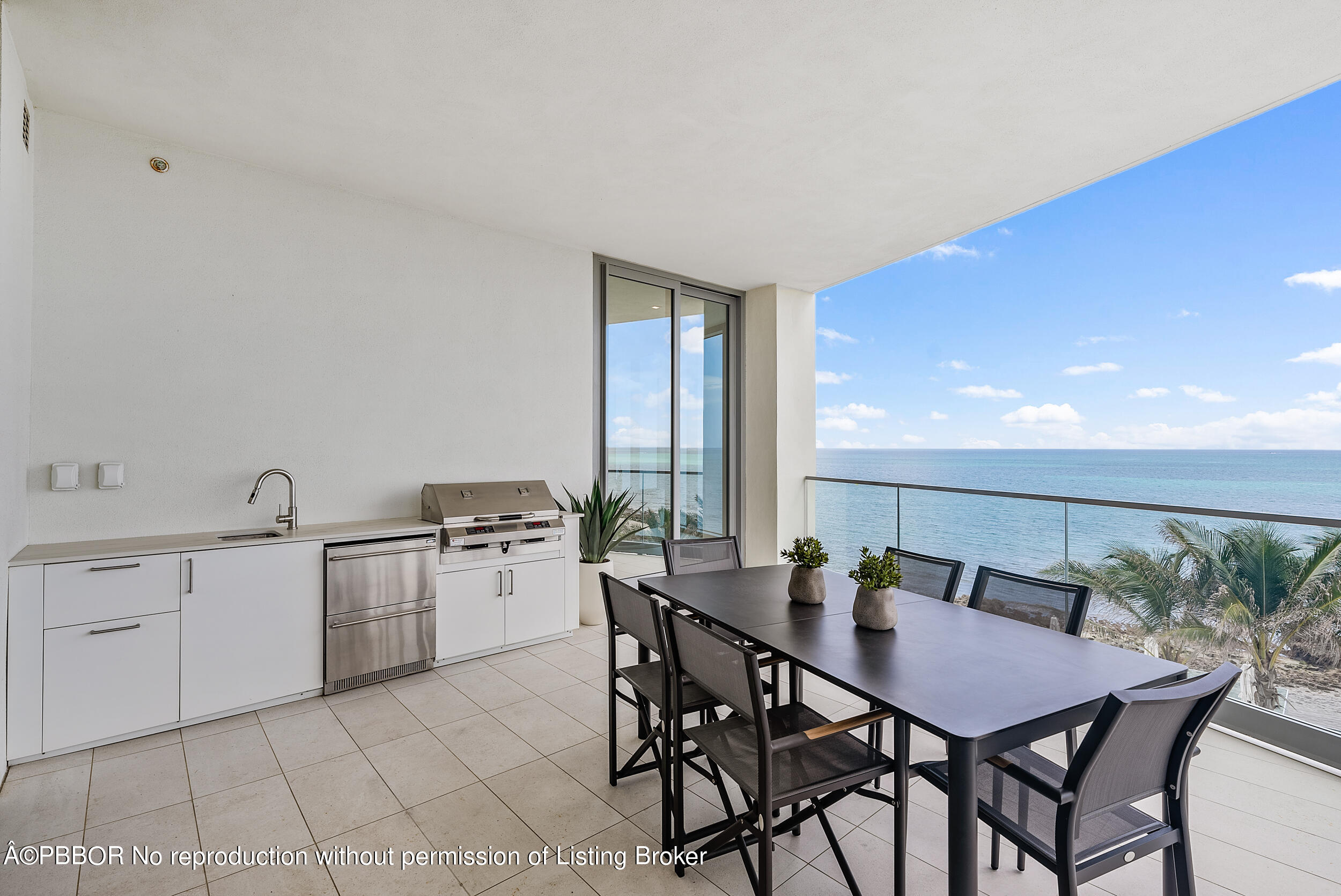 1500 South Beach Road, Unit 403 Jupiter, FL 33469 - Photo 26 of 36 a kitchen with a table and chairs in it