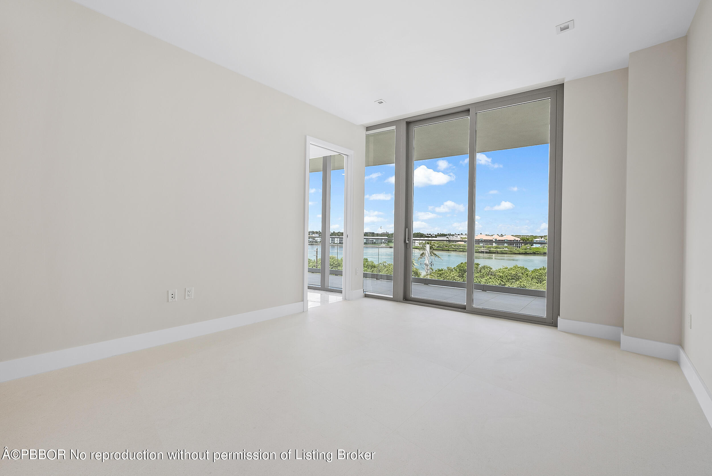 1500 South Beach Road, Unit 403 Jupiter, FL 33469 - Photo 34 of 36 a view of an empty room with a sliding door