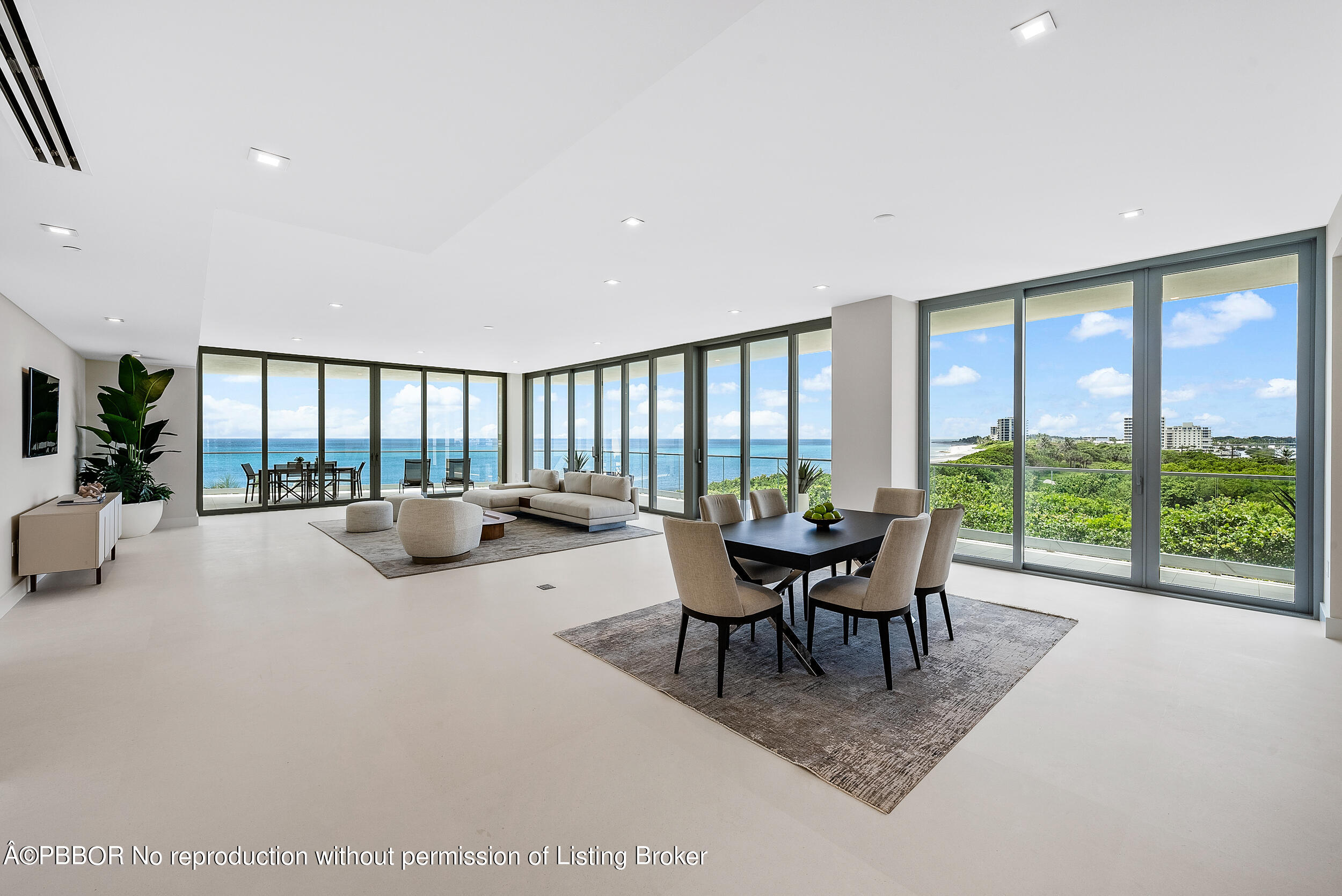 1500 South Beach Road, Unit 403 Jupiter, FL 33469 - Photo 4 of 36 a dining room with furniture and a large window