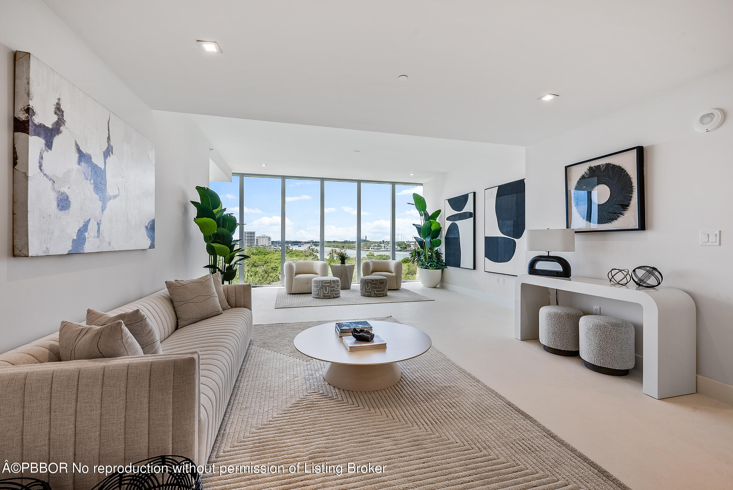 1500 South Beach Road, Unit 403 Jupiter, FL 33469 - Photo 6 of 36 a living room with furniture and a large window