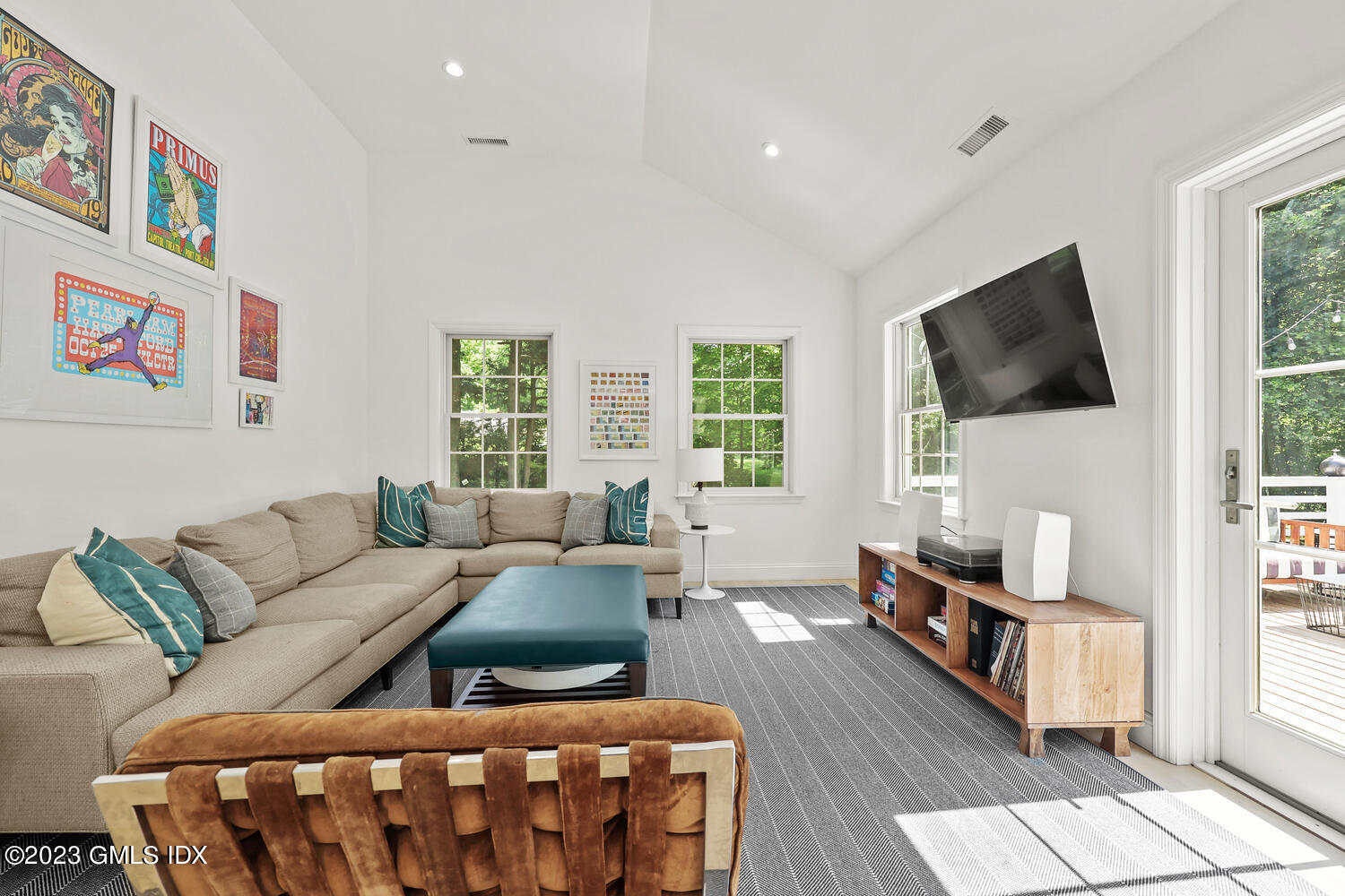 7 Cottontail Road Cos Cob, CT 06807 - Photo 16 of 39 a living room with furniture and a flat screen tv