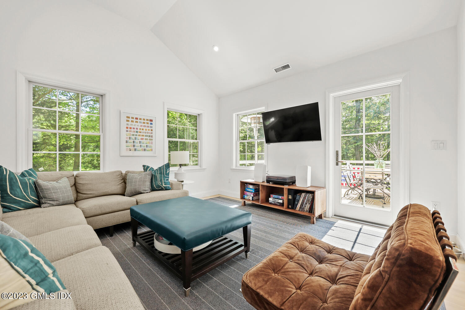 7 Cottontail Road Cos Cob, CT 06807 - Photo 17 of 39 a living room with furniture and a flat screen tv