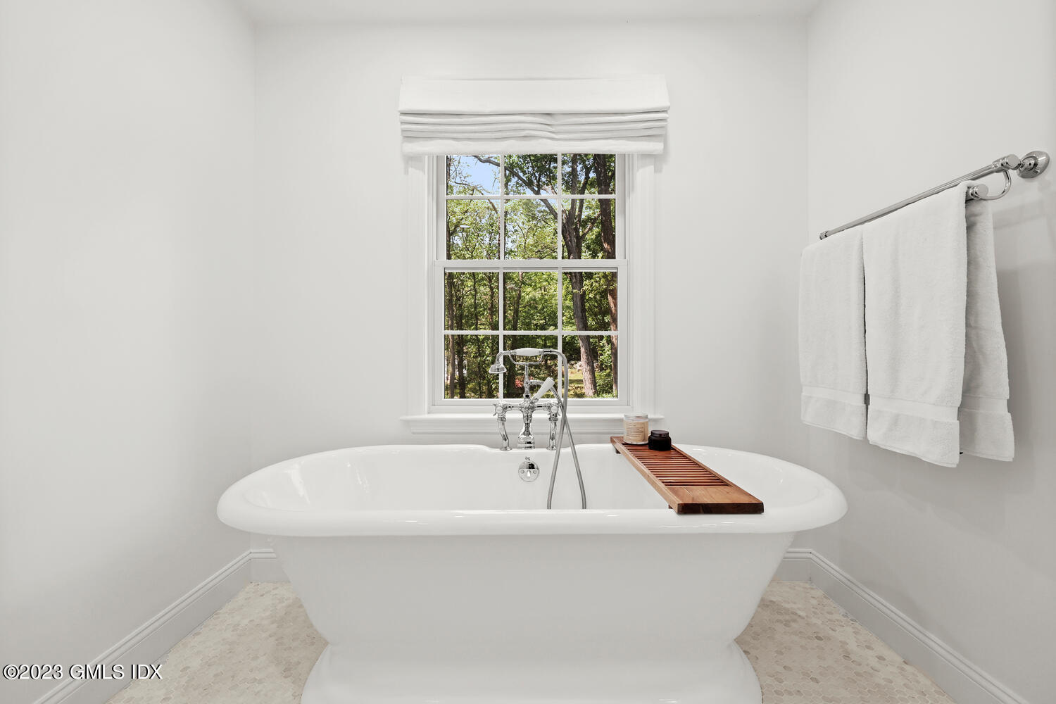 7 Cottontail Road Cos Cob, CT 06807 - Photo 22 of 39 a bath tub sitting next to a window