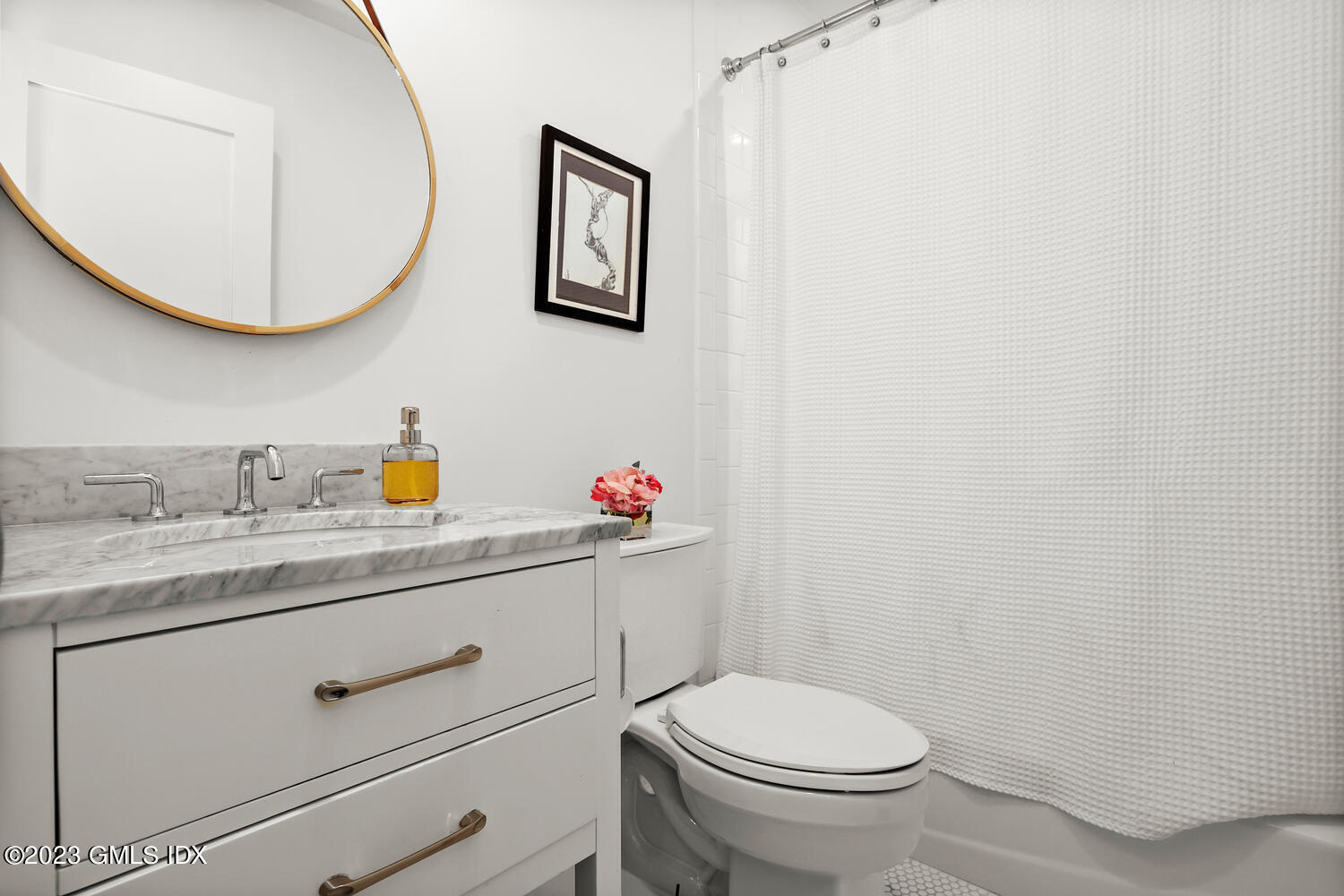 7 Cottontail Road Cos Cob, CT 06807 - Photo 25 of 39 a bathroom with a toilet a sink and mirror