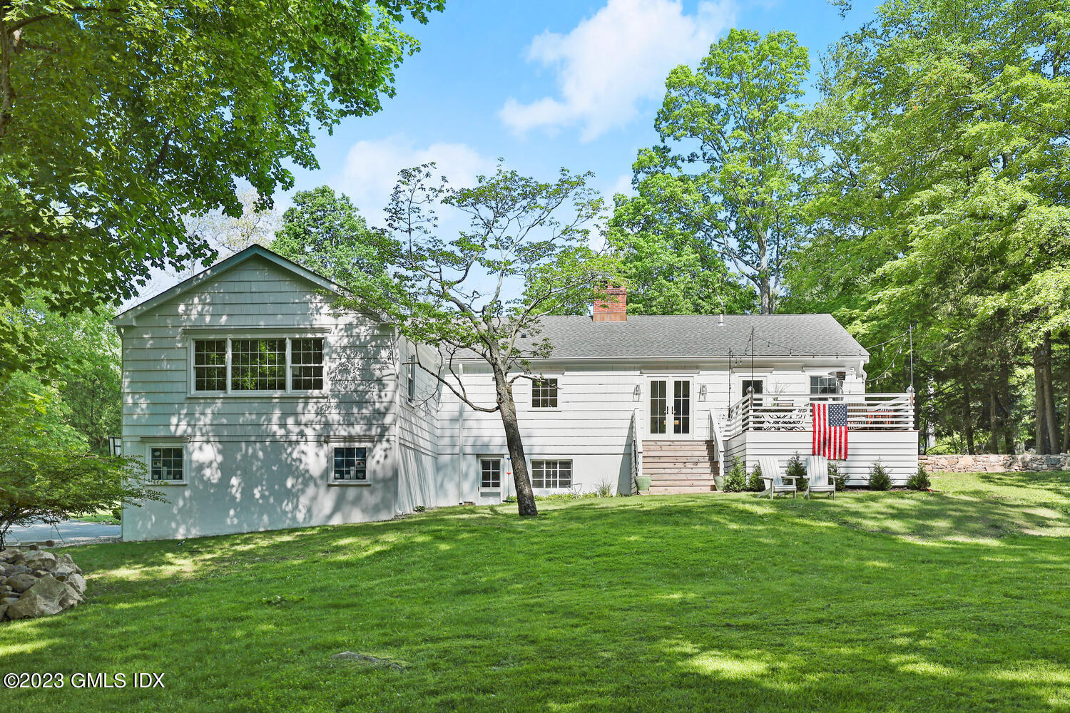 7 Cottontail Road Cos Cob, CT 06807 - Photo 34 of 39 a front view of house with yard and green space