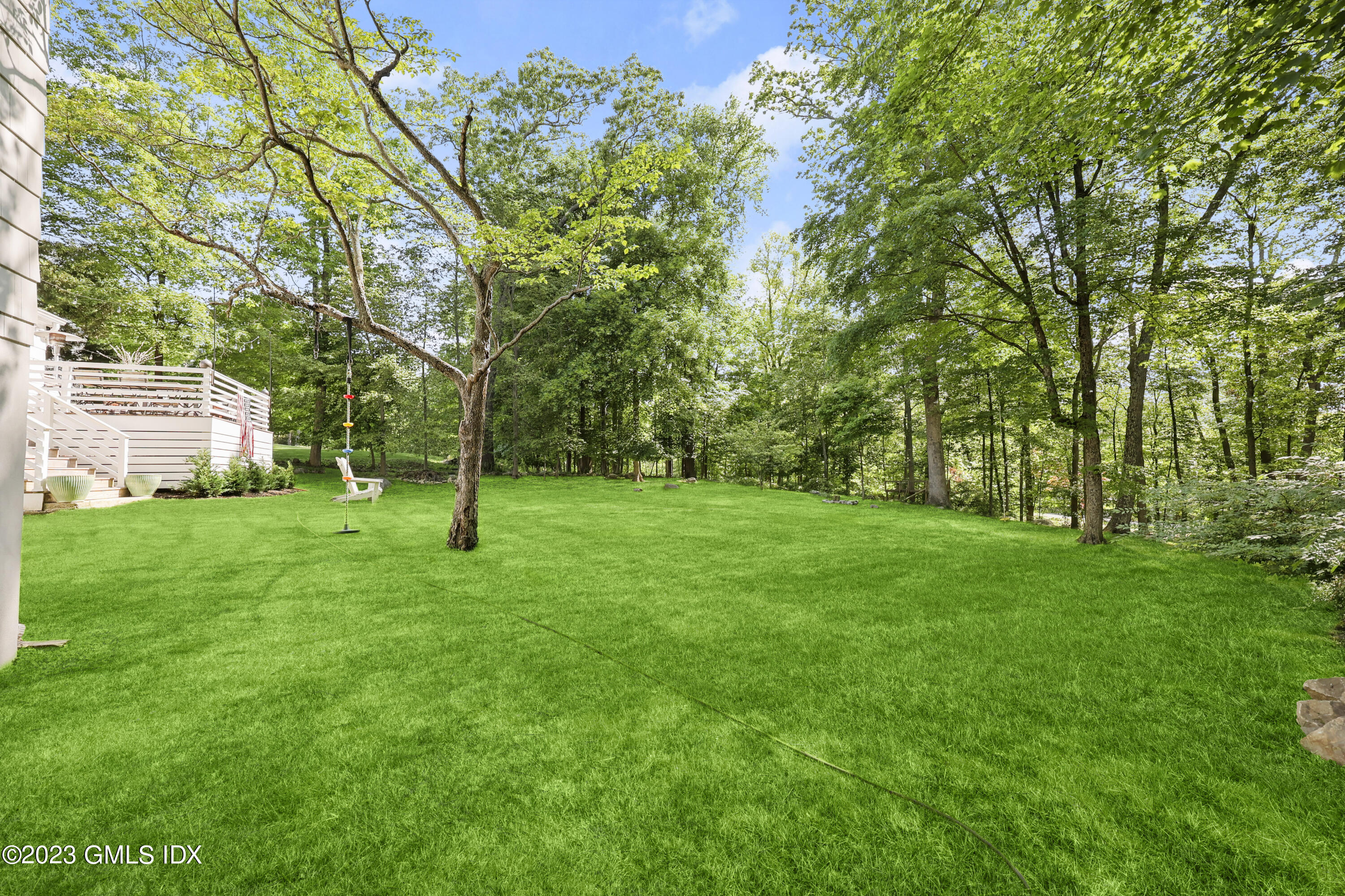 7 Cottontail Road Cos Cob, CT 06807 - Photo 35 of 39 a view of a backyard with a garden