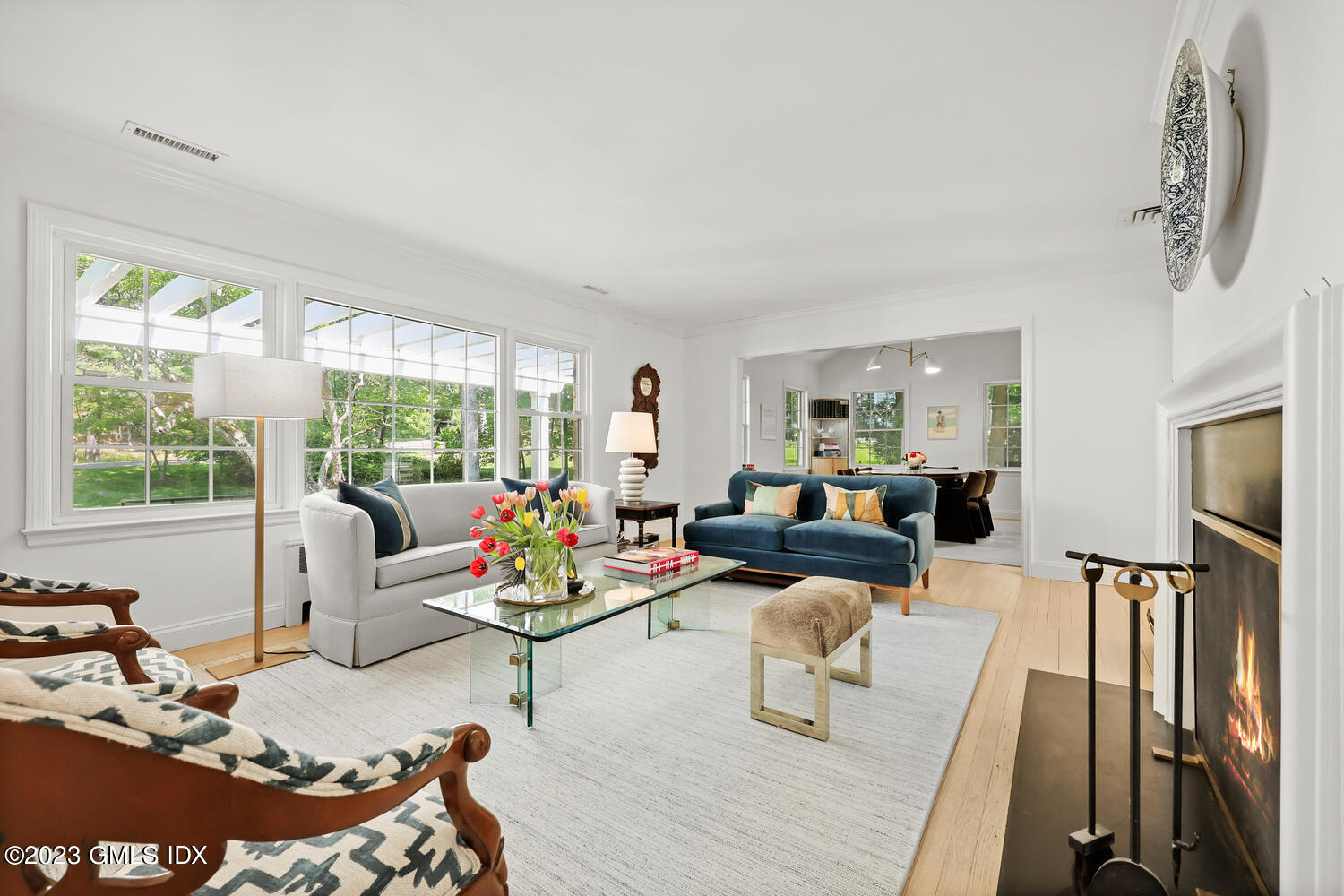7 Cottontail Road Cos Cob, CT 06807 - Photo 5 of 39 a living room with furniture fireplace and large window