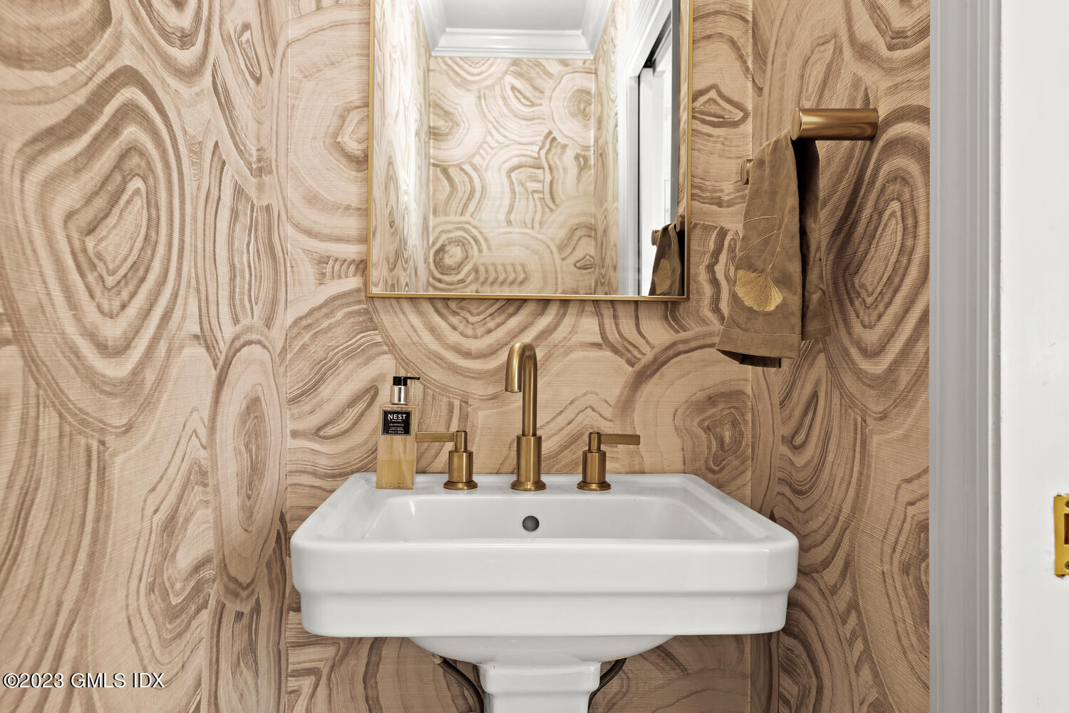 7 Cottontail Road Cos Cob, CT 06807 - Photo 10 of 39 a bathroom with a sink and mirror with bathtub