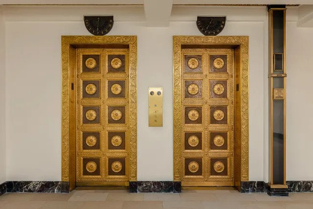 a view of a livingroom with furniture and a chandelier