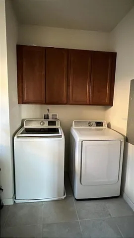 a view of hallway with wooden floor