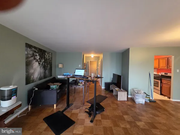 a furnished livingroom with a window