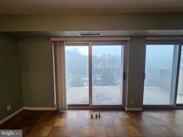 a view of a livingroom with furniture and storage