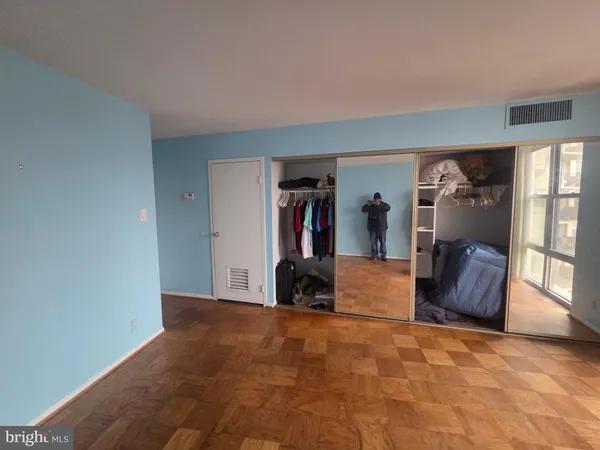 a view of an empty room and window