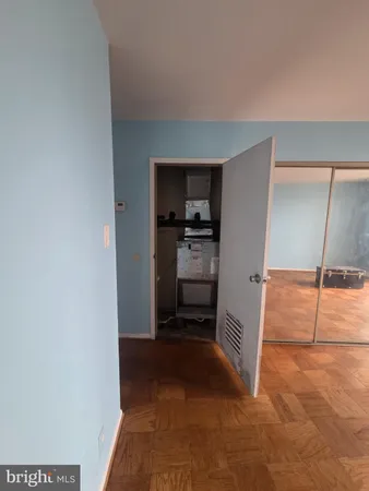 a kitchen with granite countertop a stove top oven sink and cabinets