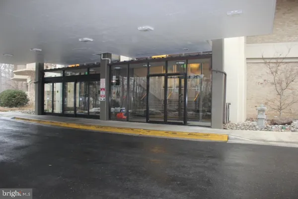 a view of swimming pool with an outdoor space and seating area