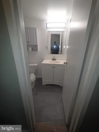 a view of a hallway with a furniture