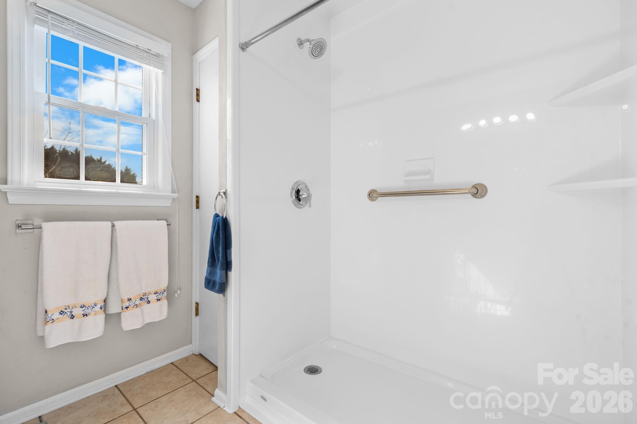 65 Pinewood Road Granite Falls, NC 28630 - Photo 28 of 42 a bathroom with a shower