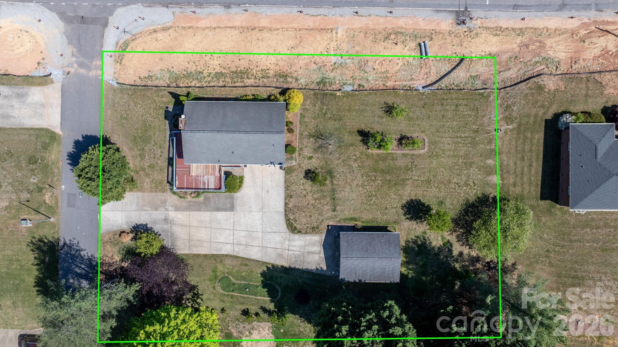65 Pinewood Road Granite Falls, NC 28630 - Photo 41 of 42 an aerial view of a house with a garden