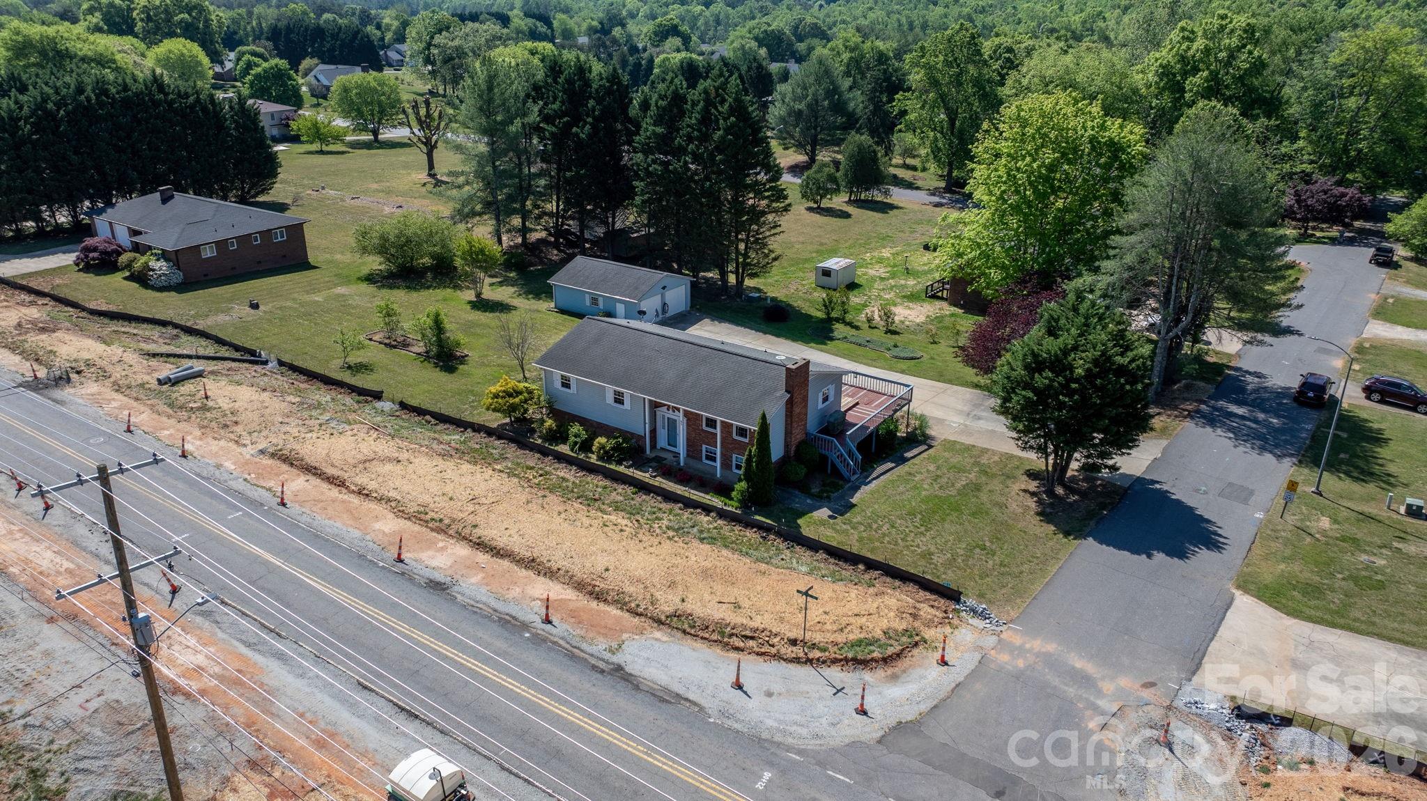 65 Pinewood Road Granite Falls, NC 28630 - Photo 42 of 42 a view of a house with a yard