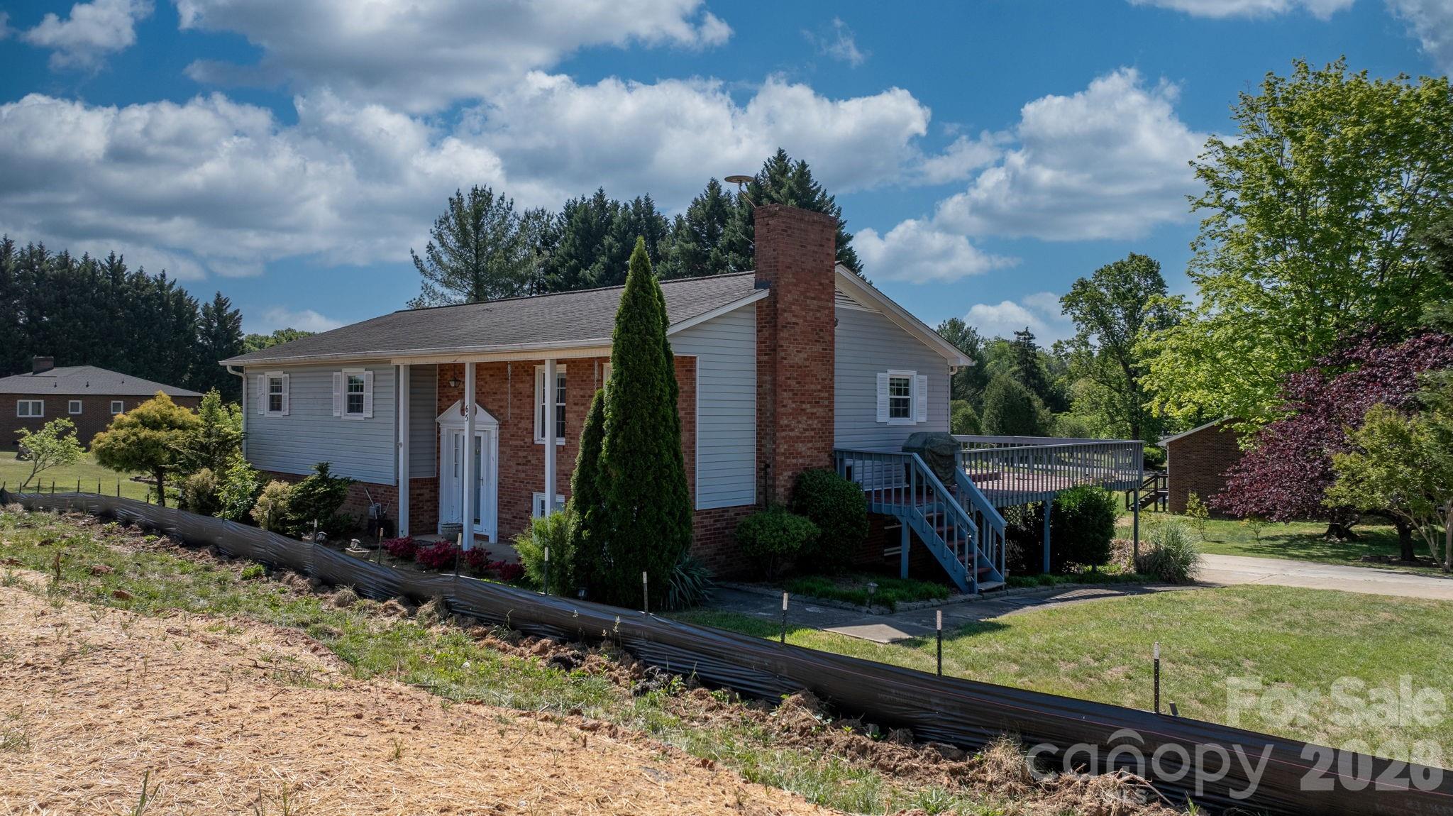 65 Pinewood Road Granite Falls, NC 28630 - Photo 5 of 42 front view of house with a yard