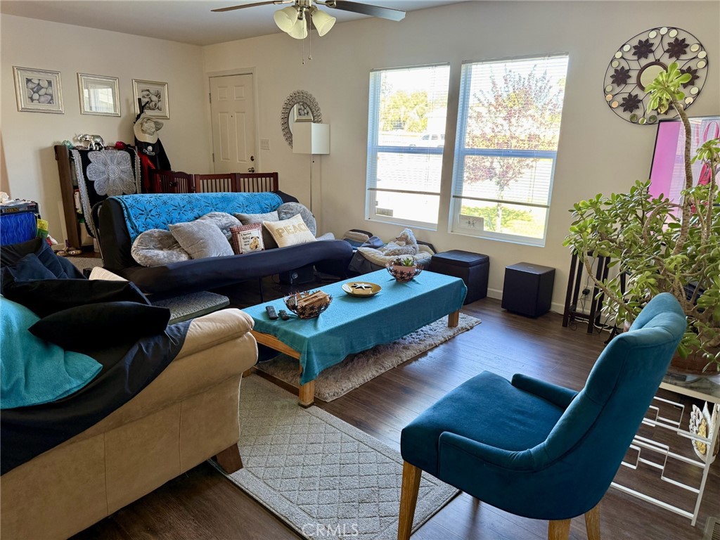 9200 Pinewood Court Atascadero, CA 93422 - Photo 21 of 26 a living room with furniture and a potted plant
