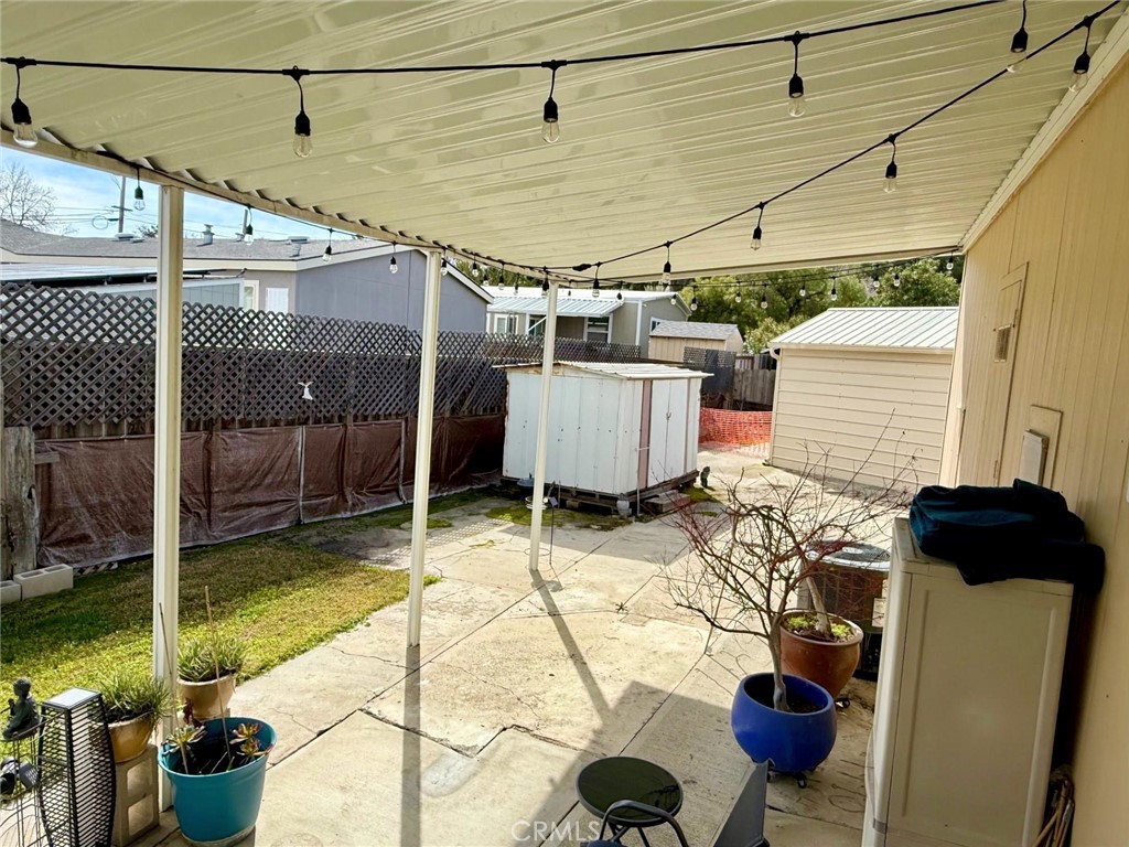 9200 Pinewood Court Atascadero, CA 93422 - Photo 4 of 26 a view of a patio with table and chairs and potted plants