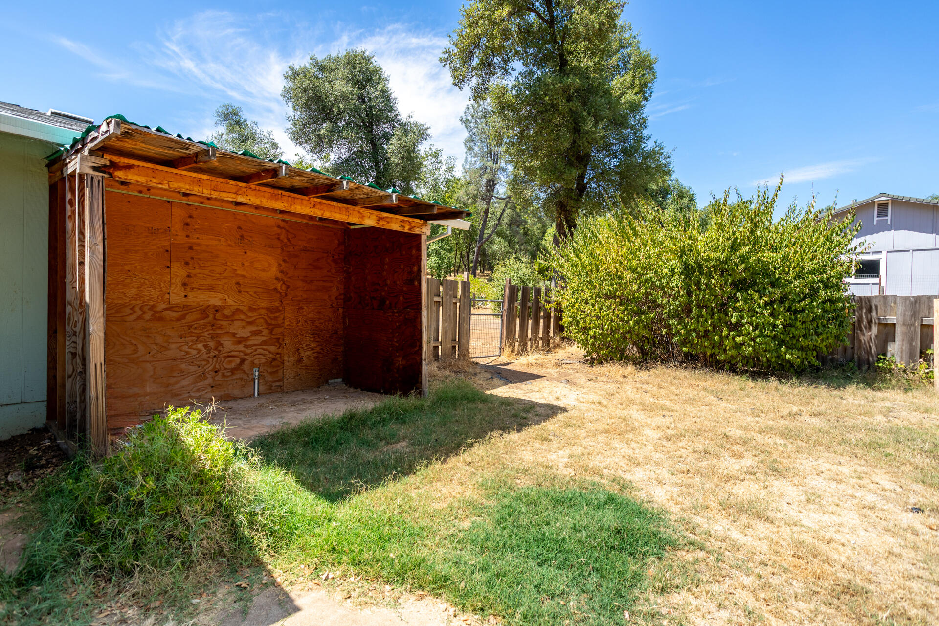 8415 Valley View Road Redding, CA 96001 - Photo 27 of 31 a view of a pathway of a house with a yard