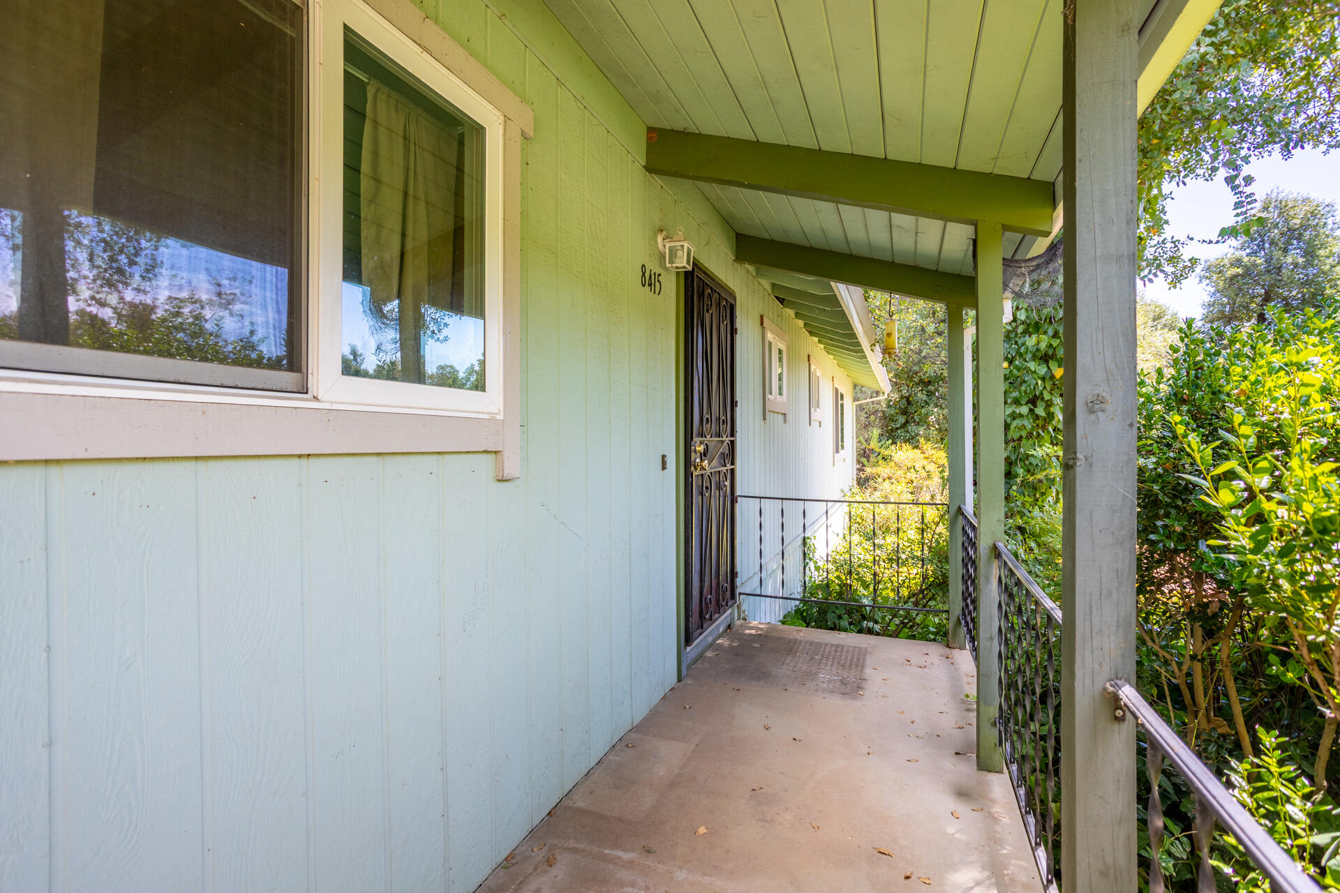 8415 Valley View Road Redding, CA 96001 - Photo 3 of 31 a view of a house with a small window