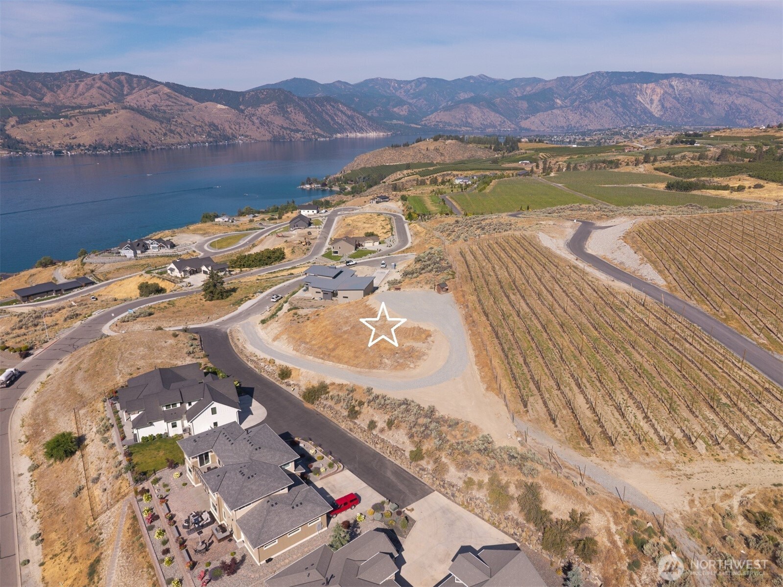 101 Lake Ridge Drive Chelan, WA 98816 - Photo 3 of 23 a view of a city and a mountain