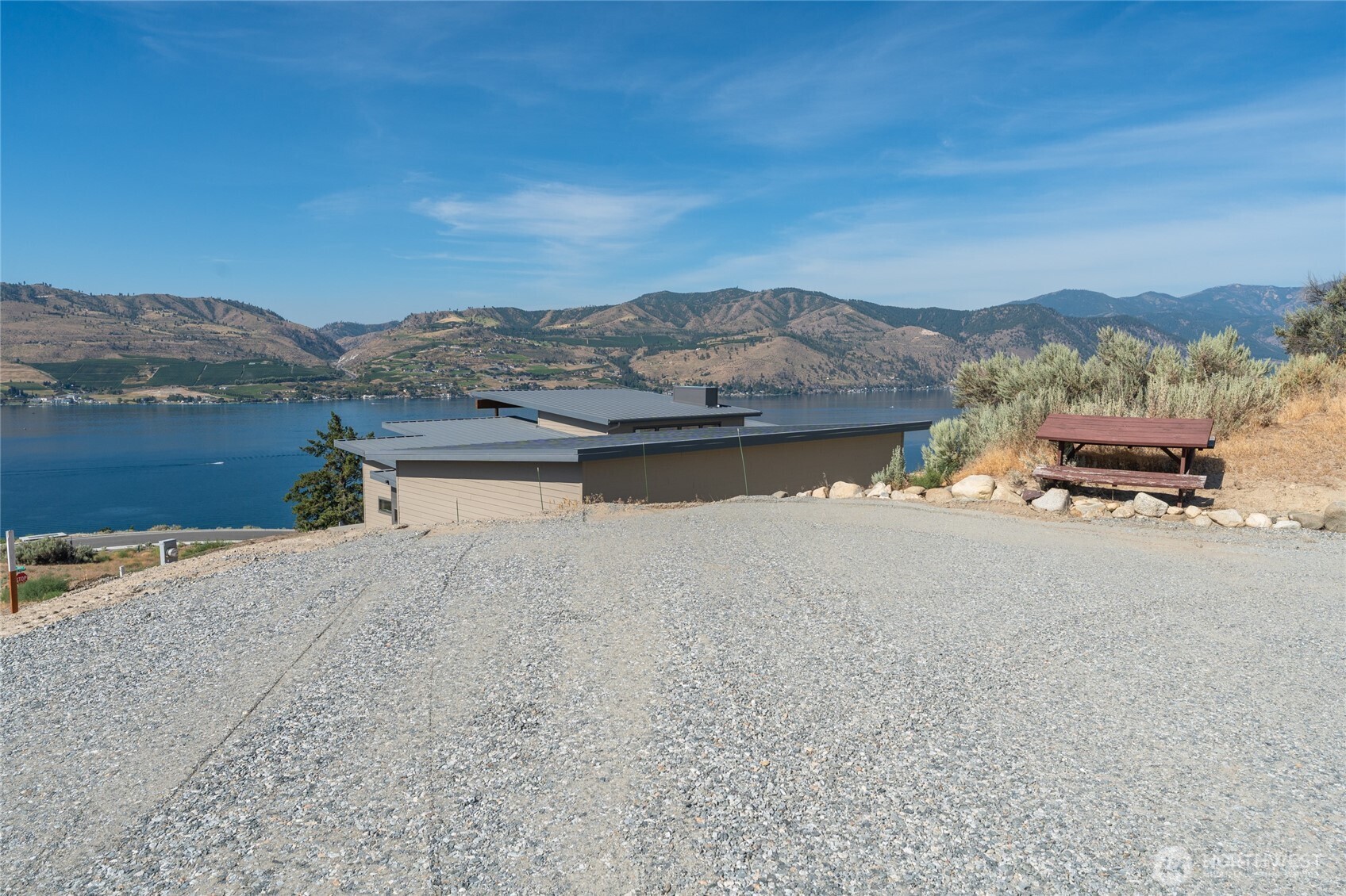 101 Lake Ridge Drive Chelan, WA 98816 - Photo 10 of 23 a view of a lake with mountain