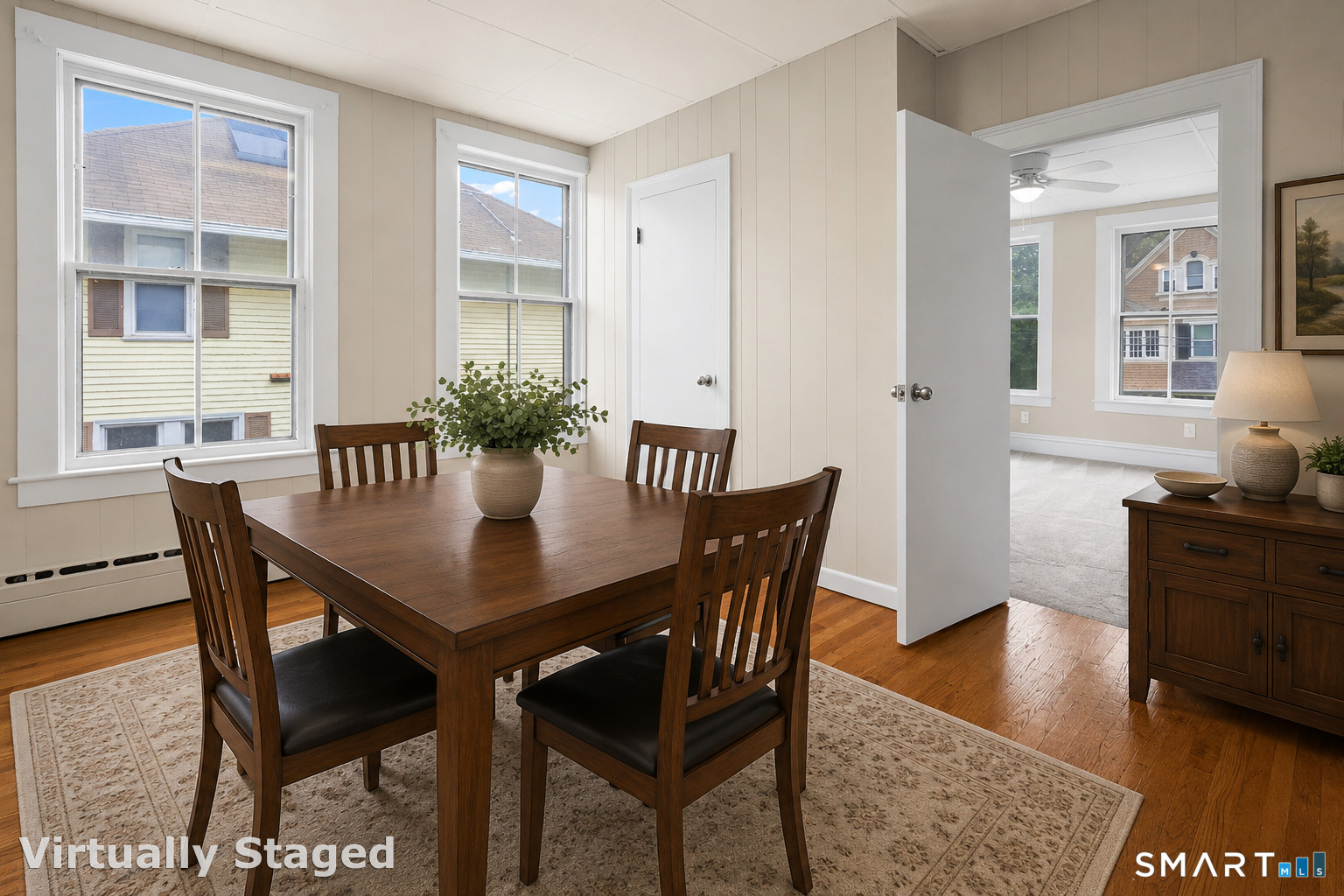 198 South Main Street Putnam, CT 06260 - Photo 18 of 21 a view of a dining room with furniture and wooden floor