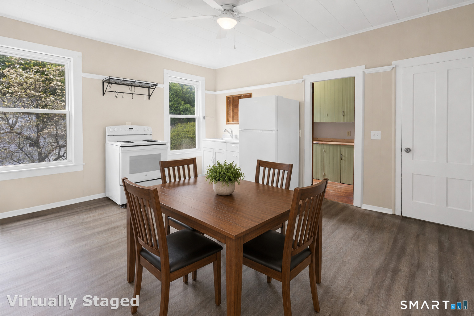 198 South Main Street Putnam, CT 06260 - Photo 3 of 21 a view of a dining room with furniture and wooden floor