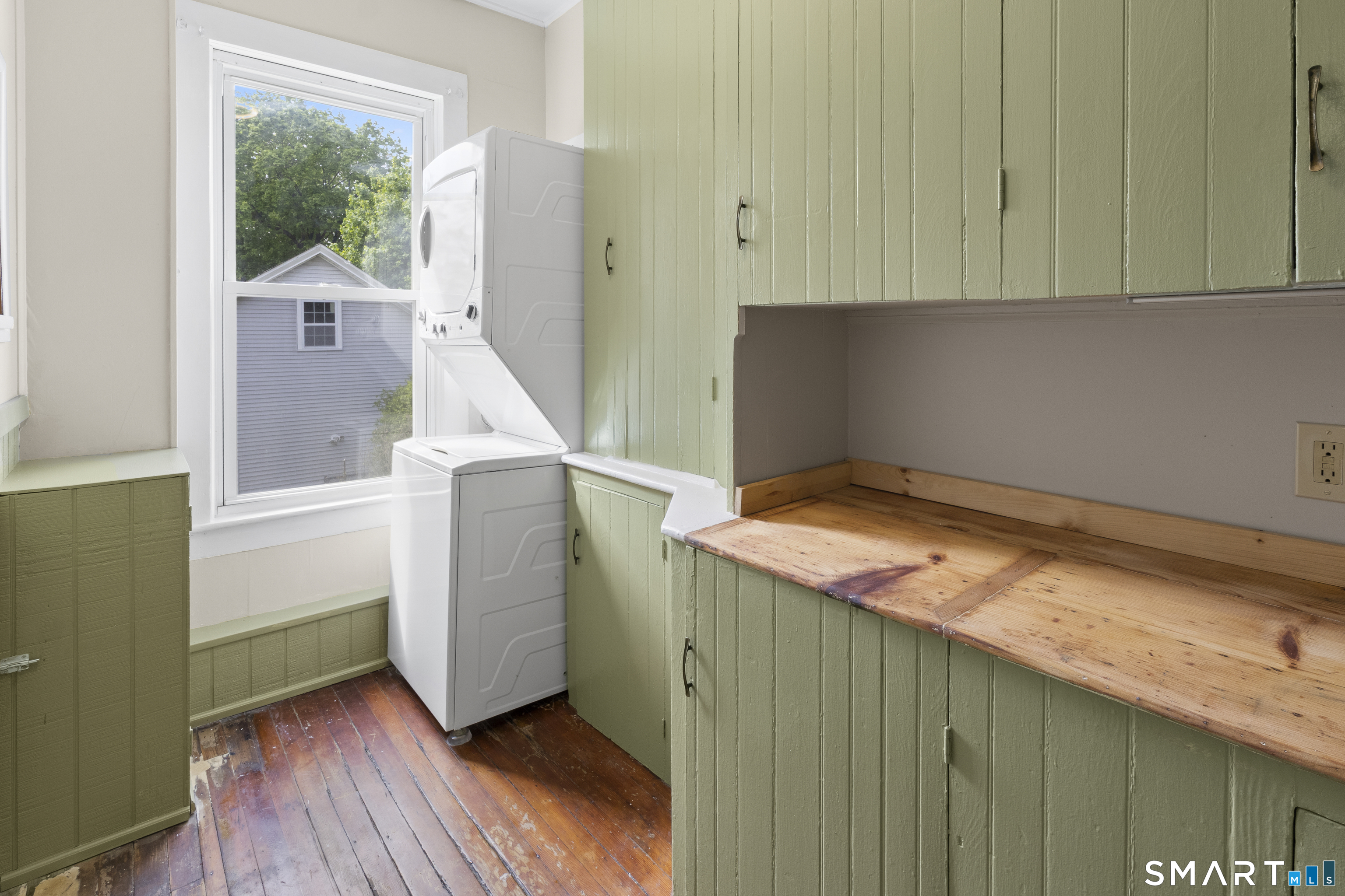 198 South Main Street Putnam, CT 06260 - Photo 5 of 21 a room with a window and wooden floor