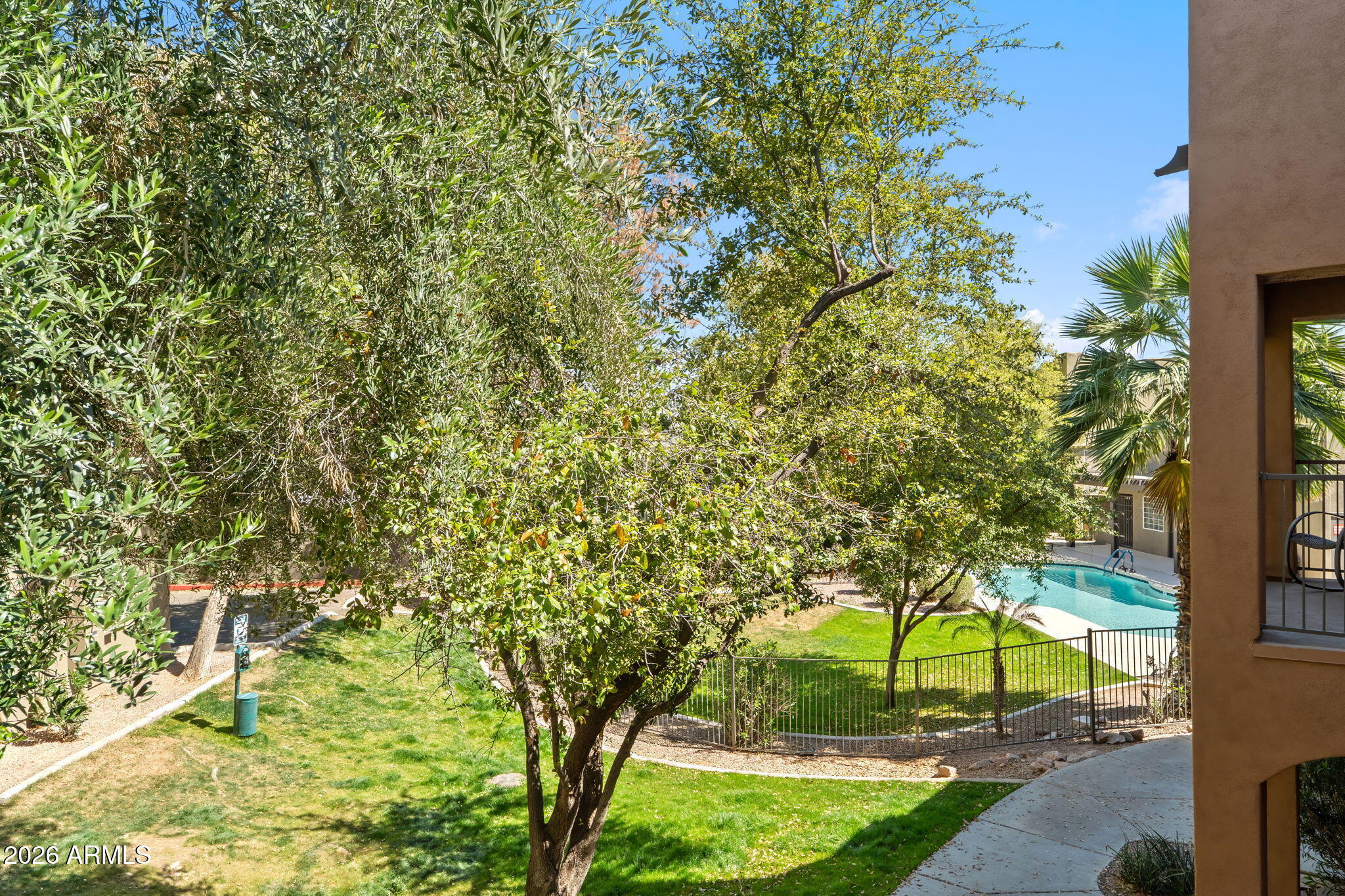 1718 West Colter Street, Unit 126 Phoenix, AZ 85015 - Photo 18 of 29 a view of a garden