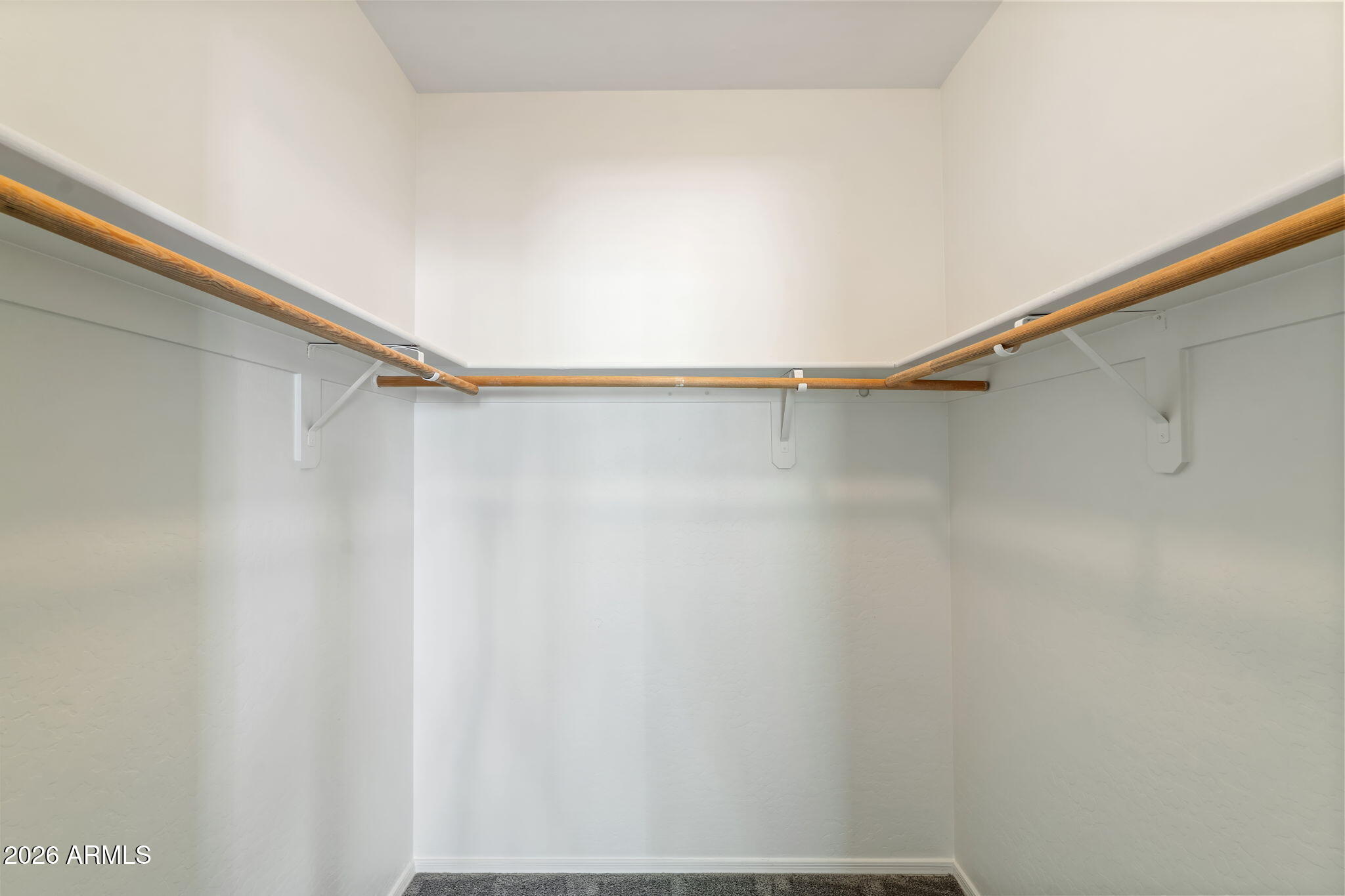 1718 West Colter Street, Unit 126 Phoenix, AZ 85015 - Photo 19 of 29 a view of a room with racks on the wall