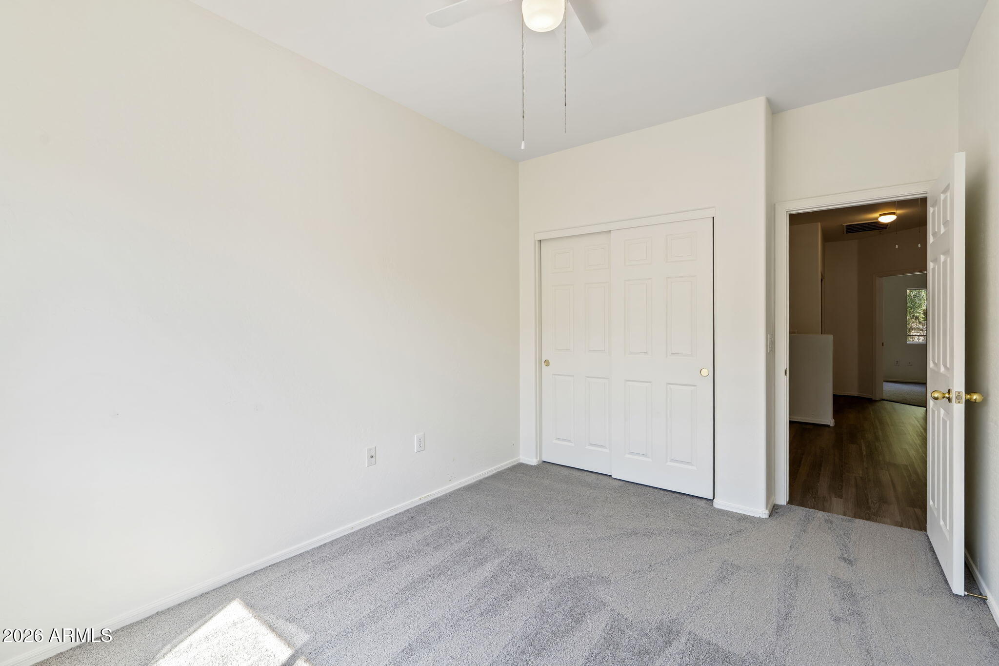 1718 West Colter Street, Unit 126 Phoenix, AZ 85015 - Photo 25 of 29 a view of a room with an empty space