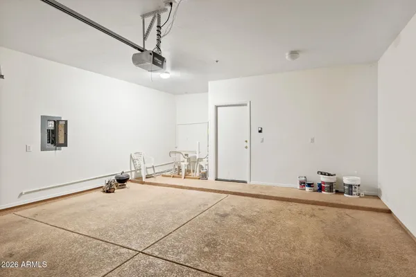 a view of a street with a building in the background