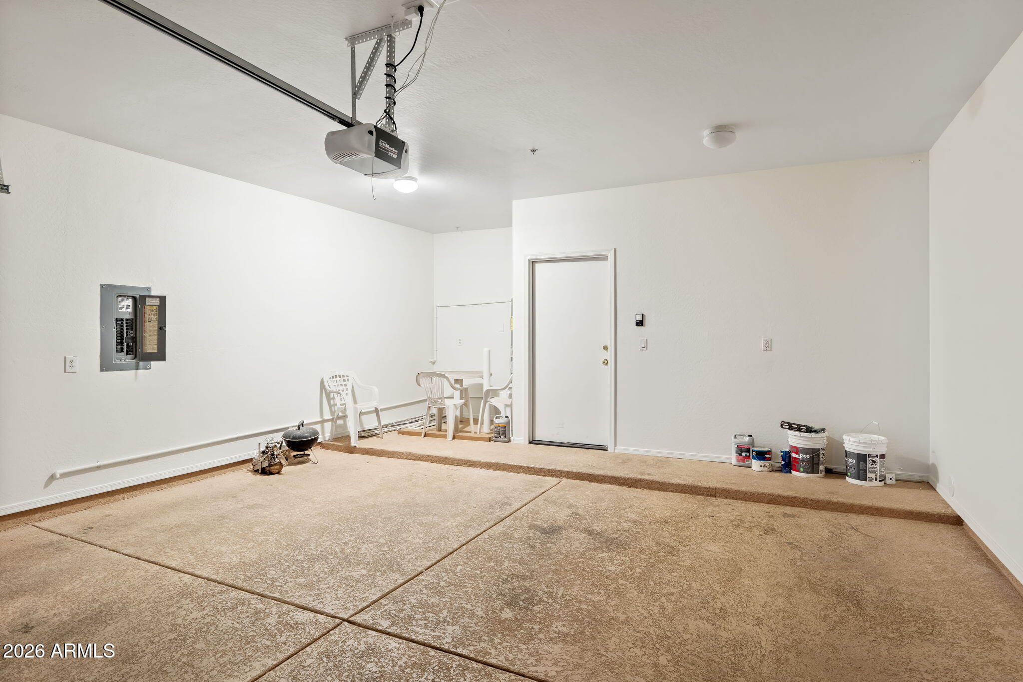 1718 West Colter Street, Unit 126 Phoenix, AZ 85015 - Photo 28 of 29 a view of a room with gym equipment