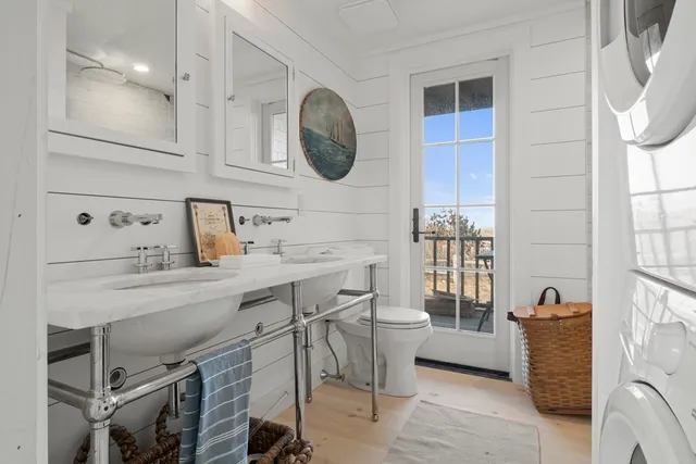 a living room with a couch and a table with wooden floor