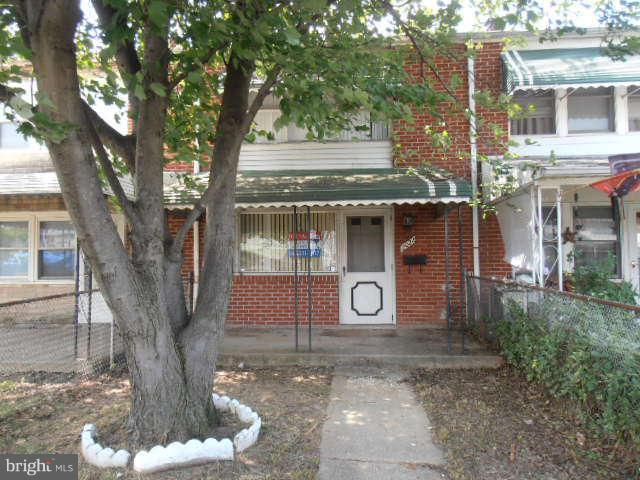 2022 Larkhall Road Dundalk, MD 21222 - Photo 1 of 10 a front view of a house with a yard