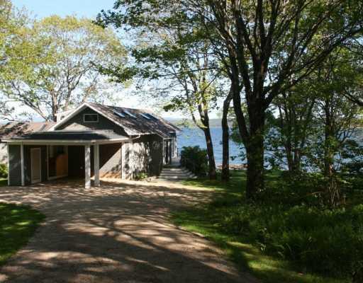 870 Oak Point Road Trenton, ME 04605 - Photo 2 of 4 Exterior Front. The long driveway...