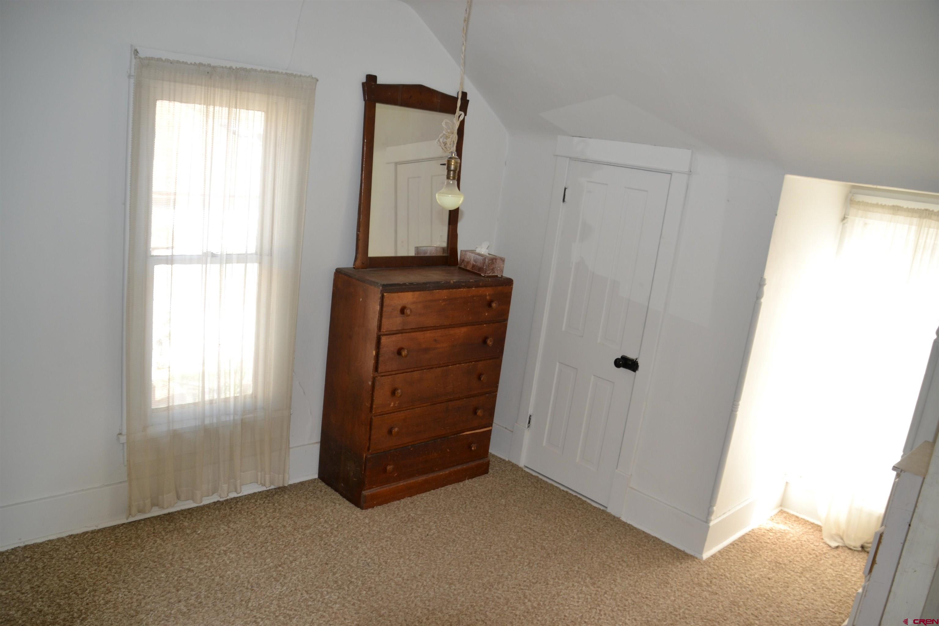 21964 Austin Road Austin, CO 81410 - Photo 20 of 33 a view of an empty room and window