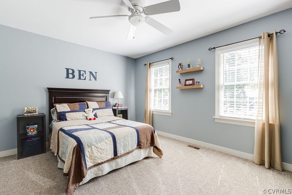 5311 Meadow Chase Road Midlothian, VA 23112 - Photo 36 of 49 a bedroom with a bed and a window