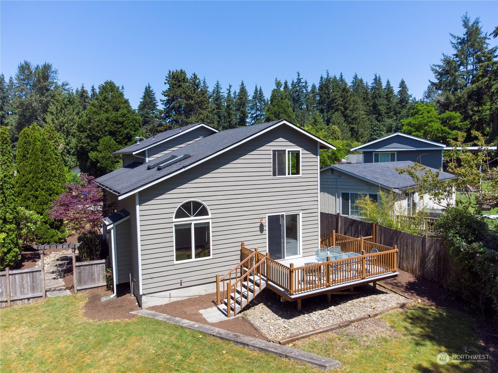 1804 224th Street Southwest Bothell, WA 98021 - Photo 30 of 31 a view of a house with a yard and furniture