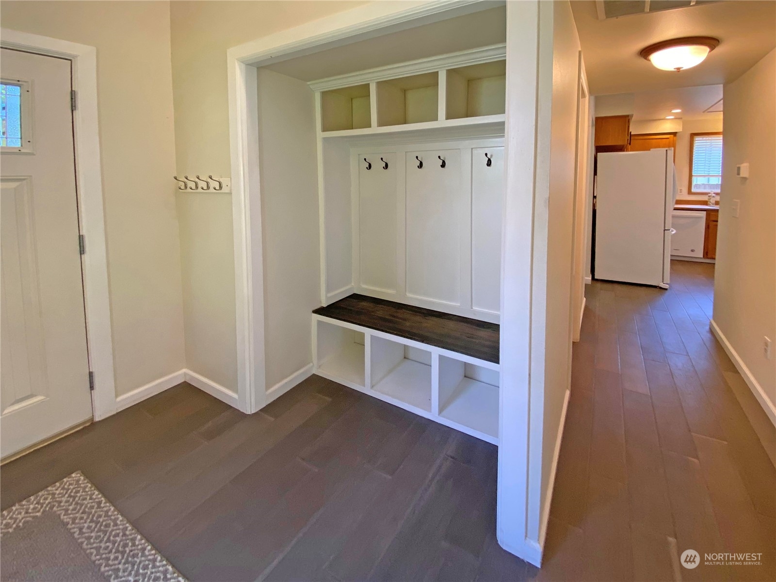 1804 224th Street Southwest Bothell, WA 98021 - Photo 4 of 31 a hallway with wooden floor