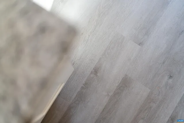 a view of a kitchen with a sink and a stove top oven
