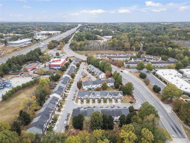 an aerial view of a city with lots of residential buildings